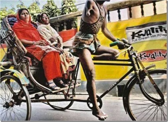 man one hand one leg rickshaw puller